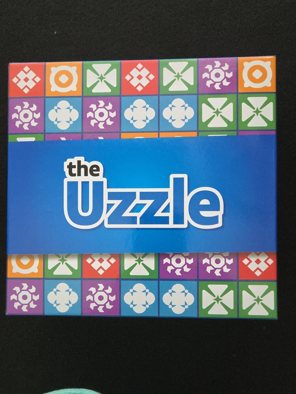 The Uzzle Card Game – Blue Box with Multicolor Icons